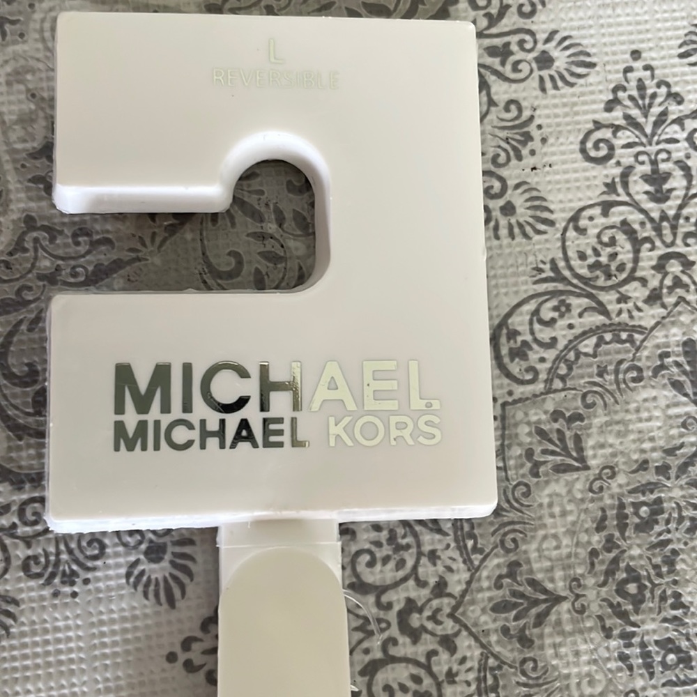 Michael kors ladies belt, reversible 1 side tan with my logo, other plain 42 in